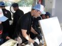 Aksi chef hideki masak nasi goreng acara pembukaan pekan olah raga polri